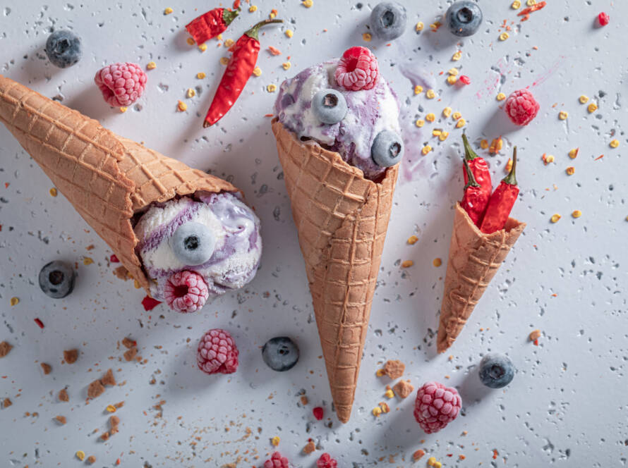 Fresh ice cream with berries and chilli. Strange icecream.
